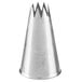 A stainless steel open star piping tip used for cake and pastry decorating.