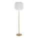 A gold floor lamp with an off-white tiered linen shade.