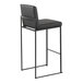 A modern black steel high-back barstool with a black faux leather back and seat.