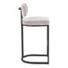 A modern barstool with a black metal frame and light gray fabric seat and backrest.