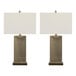 A pair of antique brass table lamps with rectangular white linen shades.