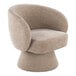 A light brown fabric swivel accent arm chair with a rounded back and a pedestal base.