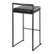 A black metal stackable low-back barstool with a black faux leather seat.