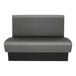A graphite-colored double back booth with channel stitching and a 36-inch high backrest.