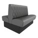 A graphite-colored double back booth with diamond tufted upholstery and a 42-inch high backrest.