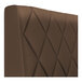 A brown diamond-tufted upholstered booth backrest.