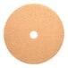 A tan, circular low-frequency floor burnishing pad with a hole in the center.