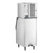 A commercial stainless steel ice machine with a storage bin and air-cooled system.