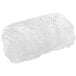 A clear, textured ice nugget produced by a commercial nugget ice machine.