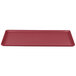 A red rectangular Cambro dietary tray with a white border.