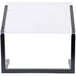 A white rectangular object with a black border on a clear plastic and black stand.