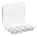A clear plastic hinged container with twelve compartments and a high dome lid for holding mini cupcakes or muffins.