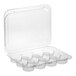 A clear plastic hinged container with 12 compartments and a low dome lid for holding mini cupcakes or muffins.