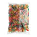 A clear plastic bag filled with assorted colorful sour mini gummy rings.