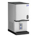 A stainless steel countertop nugget ice maker and dispenser with a sensor dispensing system.
