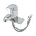 A silver T&S single lever deck mount faucet with hoses attached.