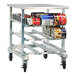 A heavy-duty aluminum mobile can rack designed to hold #10 and #5 cans, featuring multiple angled shelves and caster wheels for mobility.