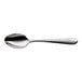 A large stainless steel teaspoon with a textured handle.