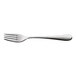 A stainless steel dessert fork with a textured handle.