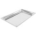 A Vollrath stainless steel table pan with perforated edges.