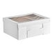 A white adjustable bakery box with a clear window on the lid, designed for holding half sheet cakes.