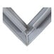 A gray, three-sided refrigerator or freezer door gasket with a V-shaped corner.