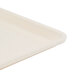 A close up of a white Cambro dietary tray with a handle.