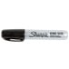 A Sharpie King Size black chisel tip permanent marker with a black cap.