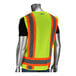 A high-visibility yellow safety vest with orange and reflective gray stripes, shown on a mannequin.