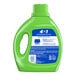 A green plastic bottle of Purex Natural Elements Linen & Lilies liquid laundry detergent.