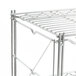 A close-up of a Metro Erecta chrome wire shelf.