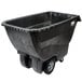 A black Rubbermaid tilt truck with wheels.