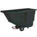 A black plastic Rubbermaid tilt truck with wheels.