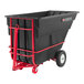 A black Rubbermaid tilt cart with wheels.