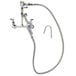 A silver T&S pot and kettle filler faucet with hose and hook nozzle.