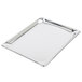 A Vollrath stainless steel steam table pan on a counter.