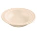 A tan GET SuperMel bowl with a white background and white rim.