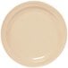 A tan GET SuperMel plate with a white round rim.