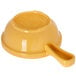 A yellow Carlisle plastic bowl with a handle.