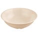 A tan SuperMel bowl with a white background.