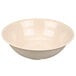 A tan SuperMel melamine bowl with a white background.
