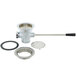 A silver metal T&S waste drain valve with a round handle and a white ring around the opening.