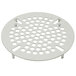 A white round metal drain valve with holes.
