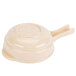 A tan melamine bowl with a handle.