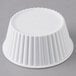 A white fluted plastic Carlisle ramekin.