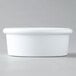 A white plastic Carlisle ramekin.