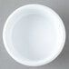 A white Carlisle plastic ramekin.