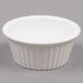 A white Carlisle fluted plastic ramekin.