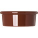A brown Carlisle plastic ramekin.