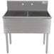 An Advance Tabco stainless steel two compartment sink on a counter.